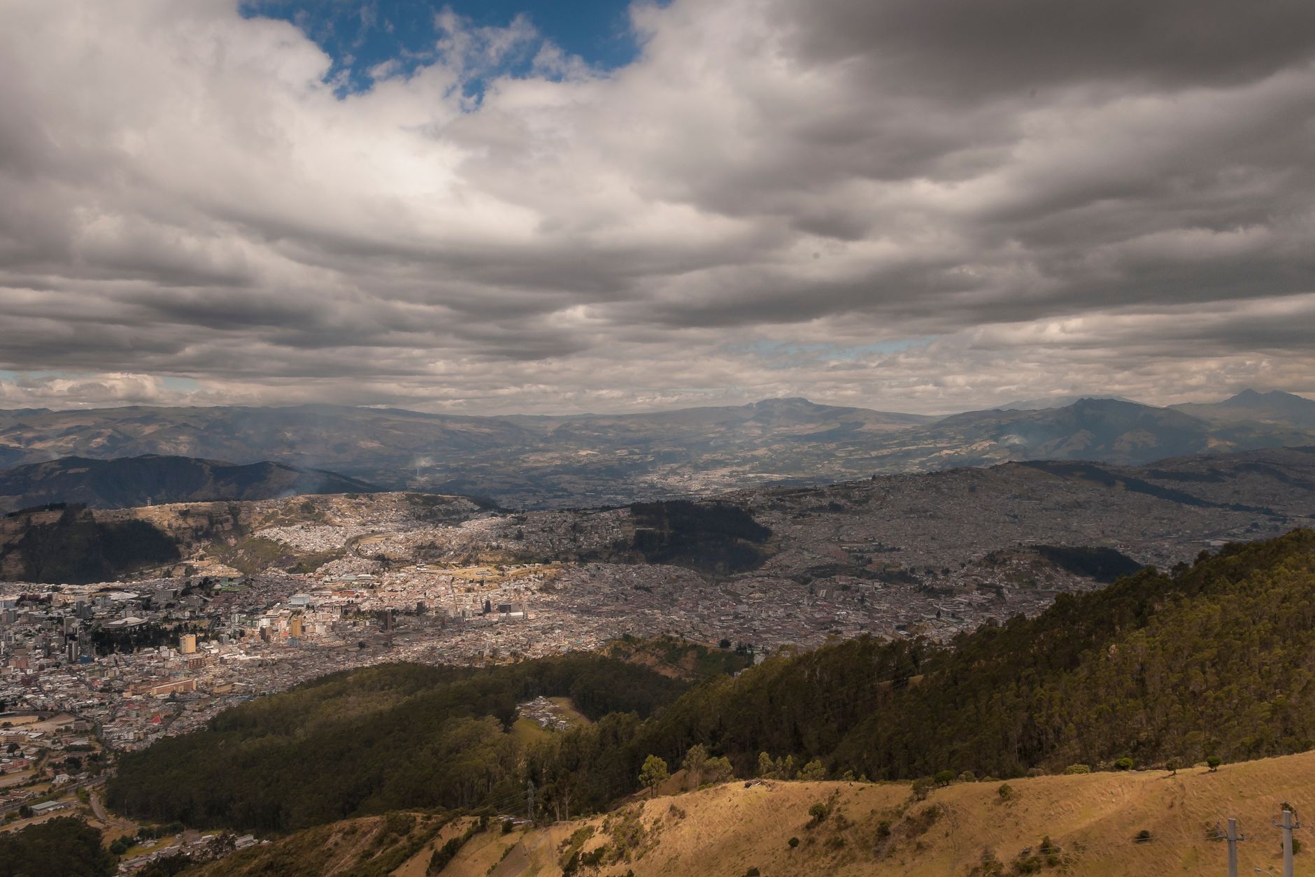 Scenic aerial view of Bogota with clouds and landscape from Monserrate Hill.