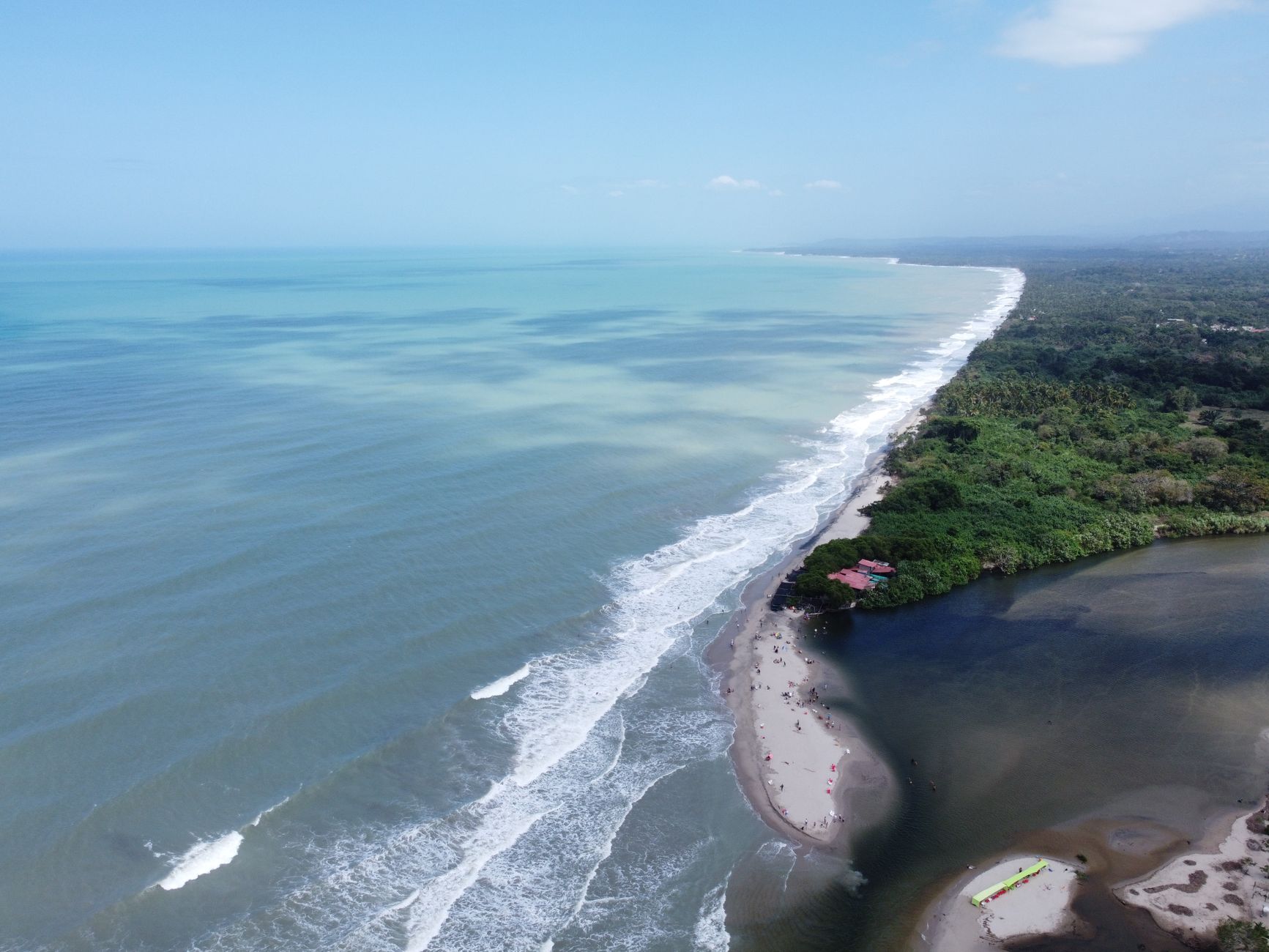 Stunning aerial view of Palomino Beach showcasing the coastline and ocean waves.