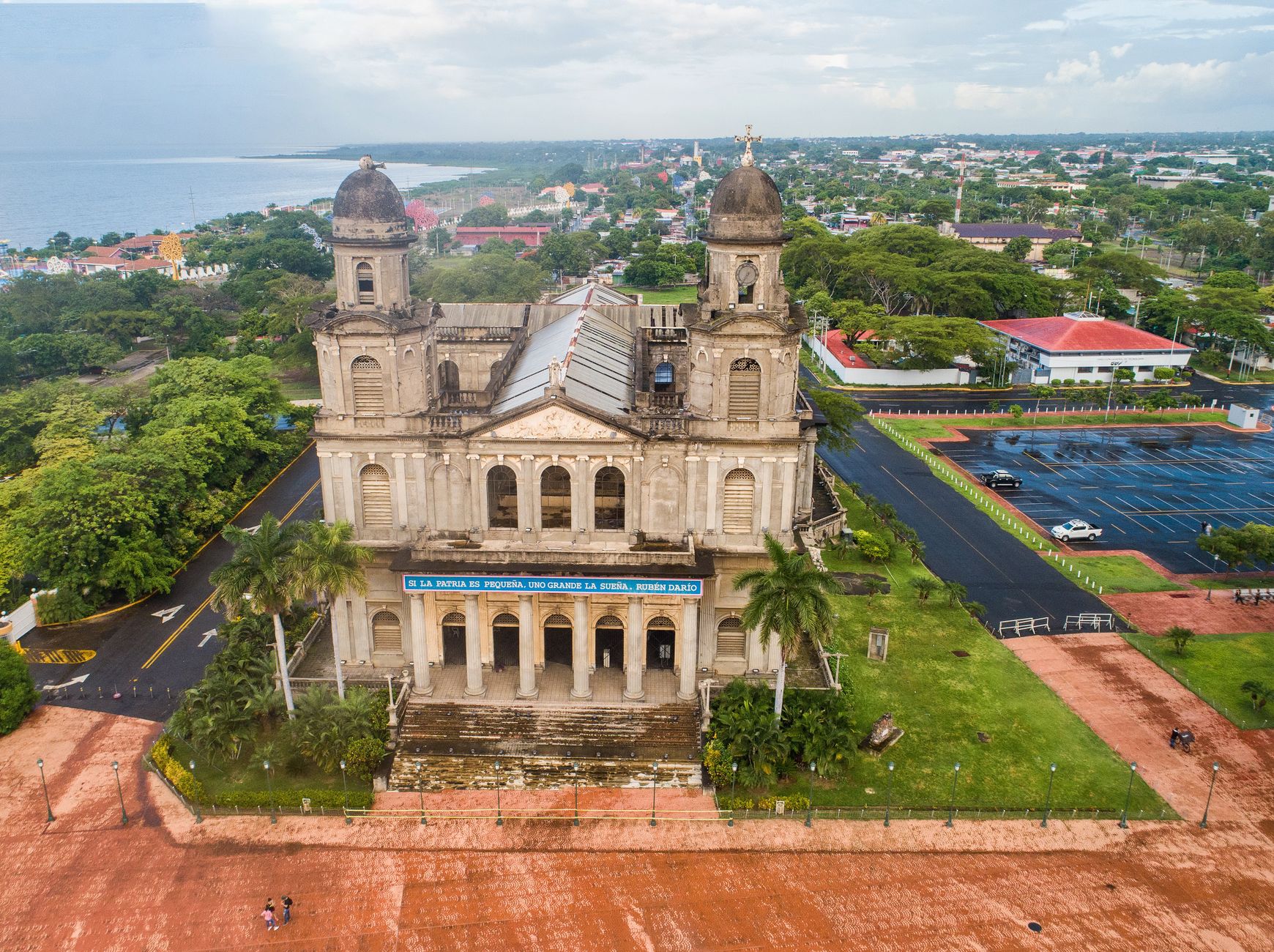 Aerial shot of the Old Cathedral of Managua, showcasing its historic architecture and surrounding cityscape.