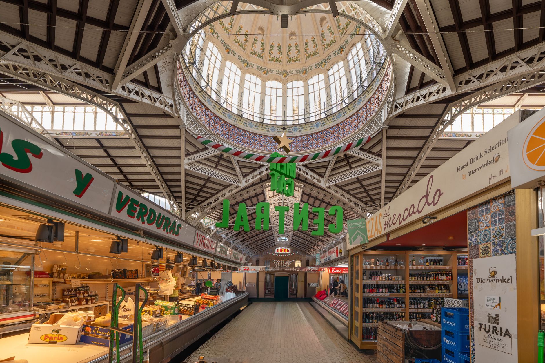 Interior view of the historic Valencia Central Market showcasing its architectural details.
