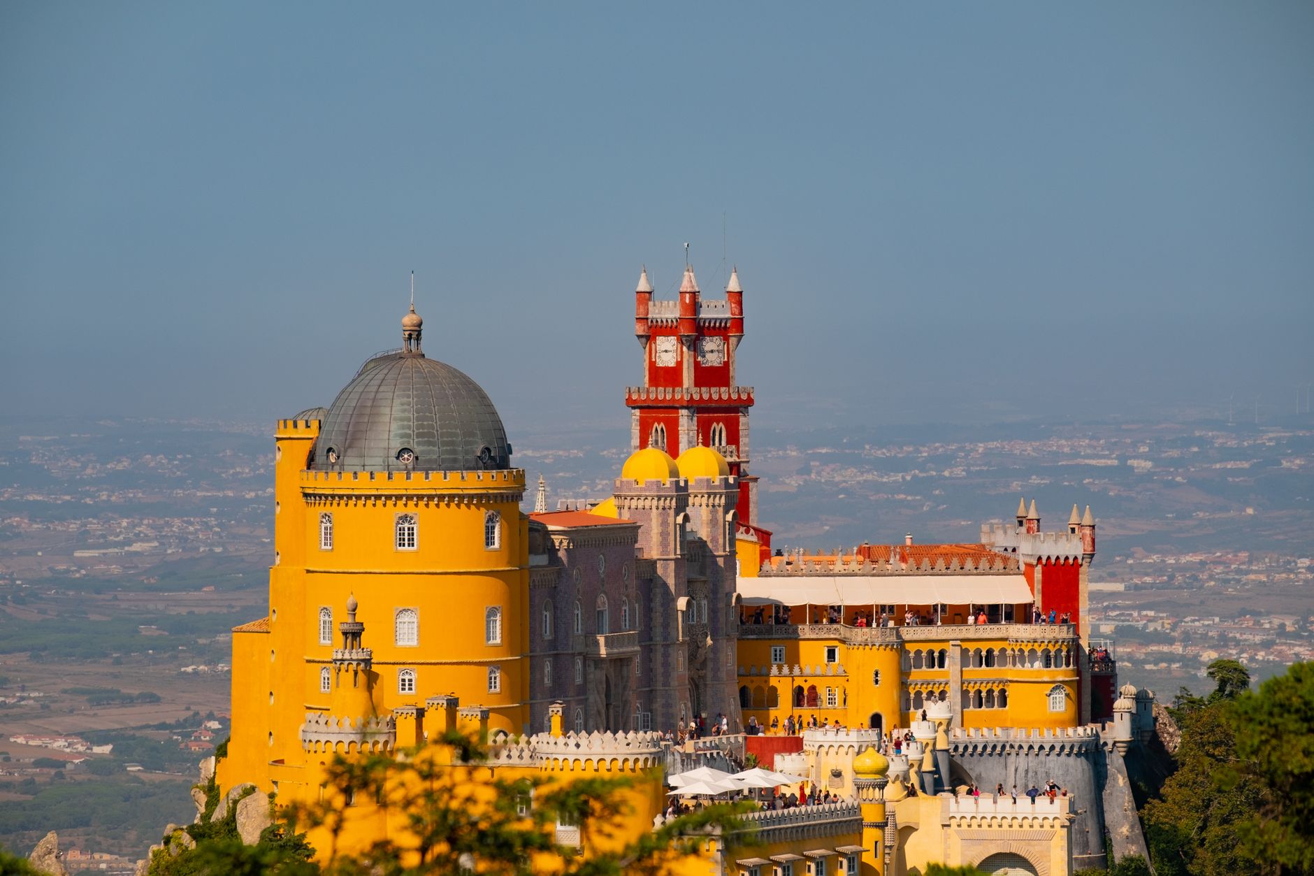 Vibrant view of Pena Palace, an iconic Romanticist landmark in Sintra, Portugal.