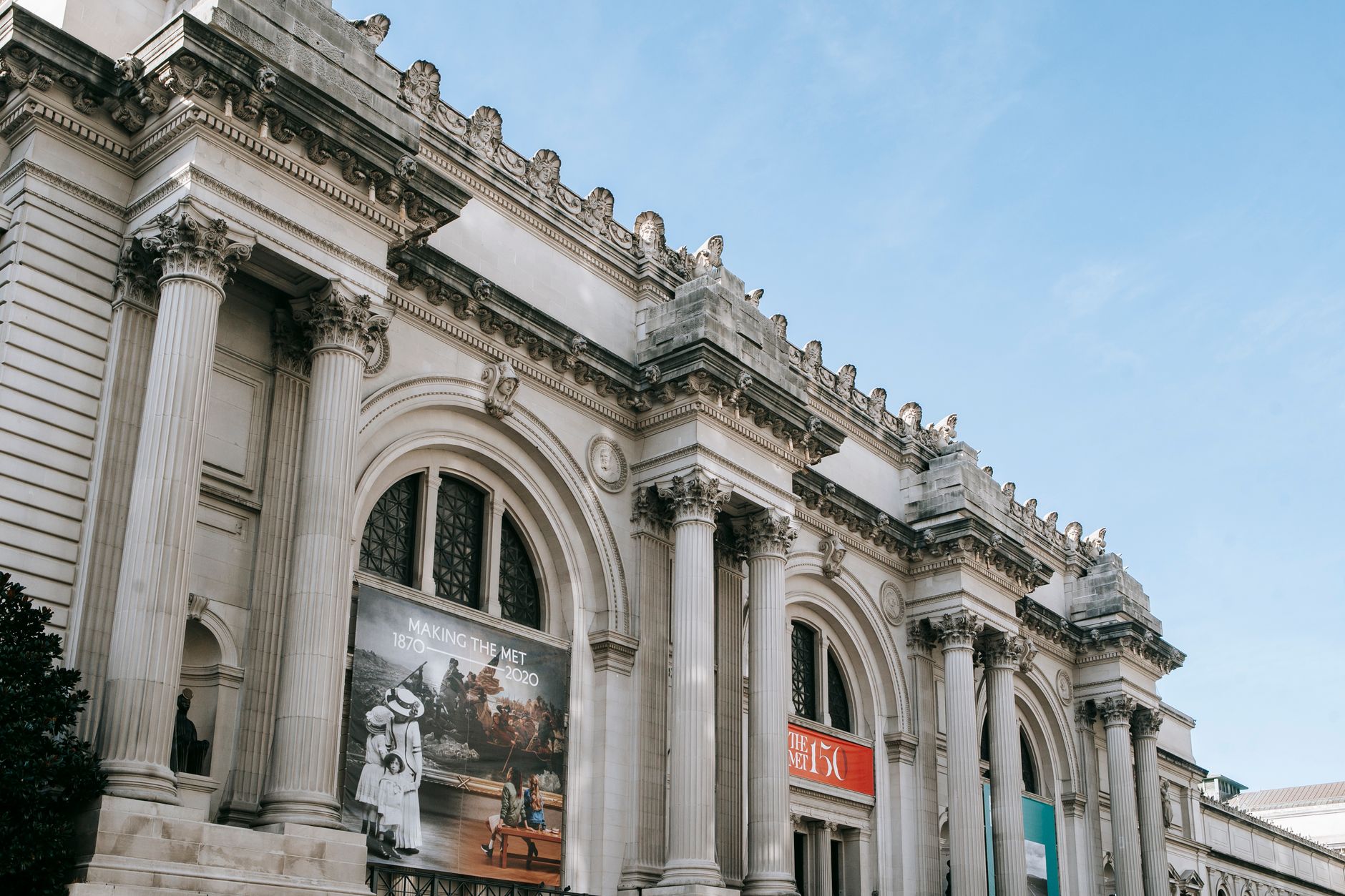 From below of exterior of Metropolitan Museum of Art located in New York City under cloudless blue sky